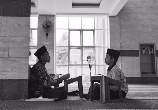 Young learner studying Quran